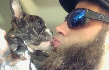 david kissing dog nugget on the lips 